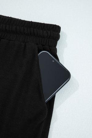 Black Ruffled Wide Leg Pull On High Waist Pants with Pockets