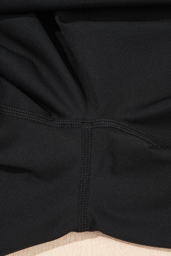Black Sleeveless Knot Skirt Hem Sports Romper